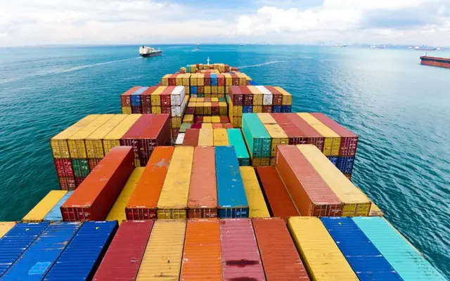 Colourful containers on a ship’s deck at sea