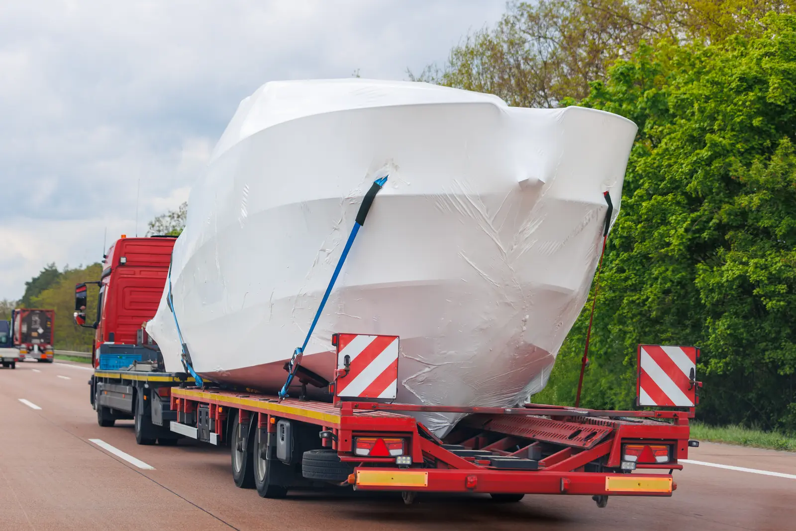 A bulky load on a flatbed, on a motorway